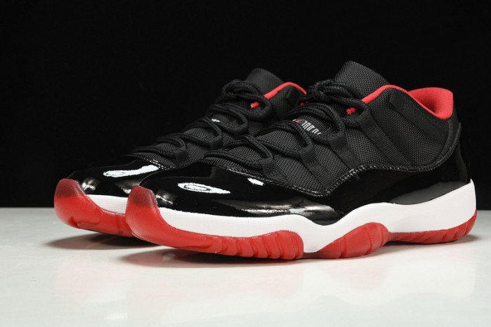 air jordan 11 retro low "bred" black/ red mens 528895-012